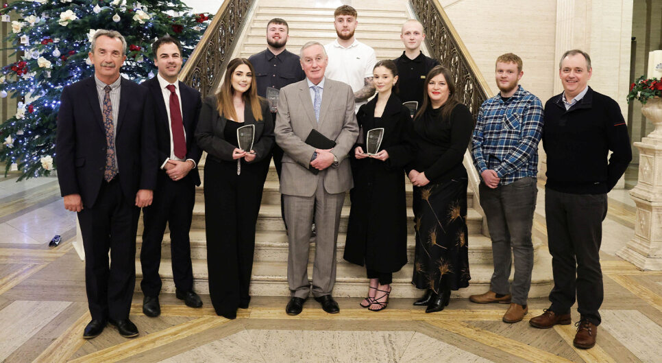 Trainees and SERC senior staff with representatives of the Department for the Economy in the Great Hall at Parliament Buildings, Stormont